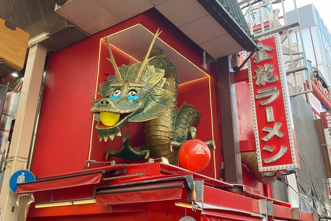 Guided Tour of Some Attractions in Osaka by Private Car - Kuromon Market is the food stop