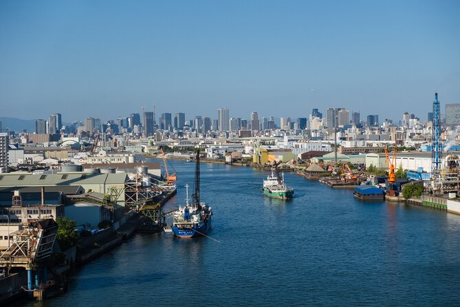 Half day Osaka Bay Area Cycling with E-Assist Bicycle Tour - Climbing Shinkizugawa Bridge