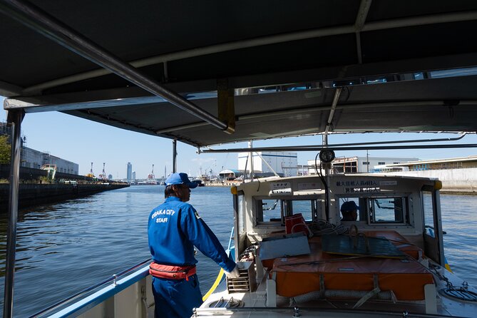 Half day Osaka Bay Area Cycling with E-Assist Bicycle Tour - A one-minute ferry through local Osaka