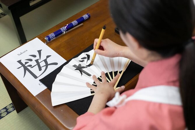 Learning Zen of Japanese Calligraphy in kimono near Osaka Castle - The photo session is part of the value