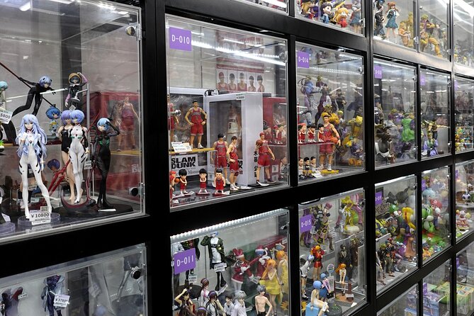 Osaka 4-Hour Walking Tour: Hotspots and Hidden Gems - Den-Den Town shifts from folklore to pop culture