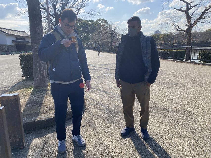 Osaka Castle Walking Tour – With Optional City Highlights - A 15-minute train ride changes the mood