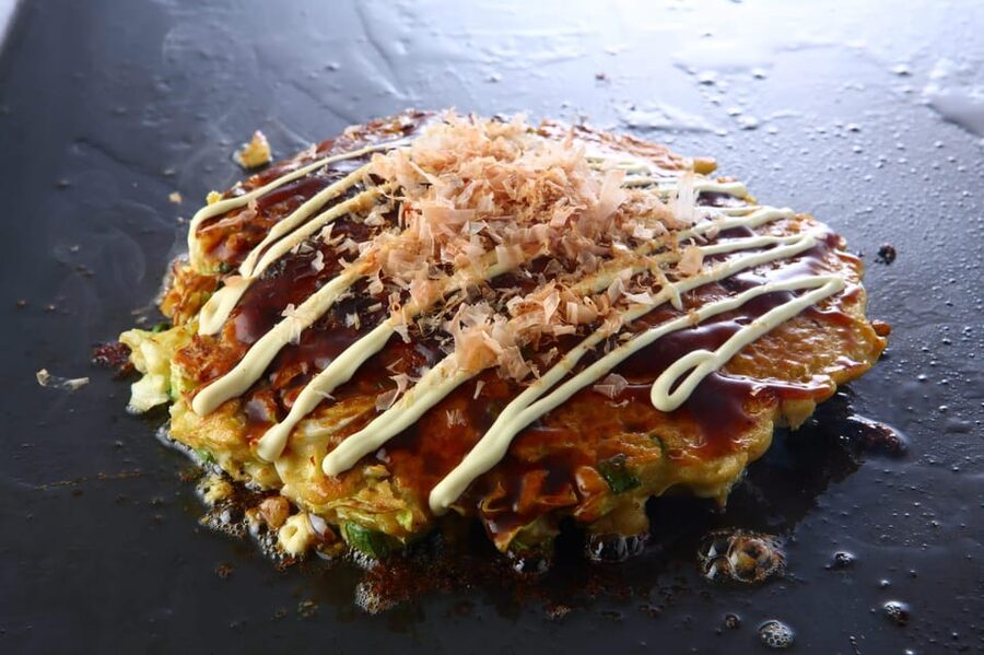 Osaka: Cooking Class & Sake Tasting with Local Market Visit - At the studio, the guide shapes the experience