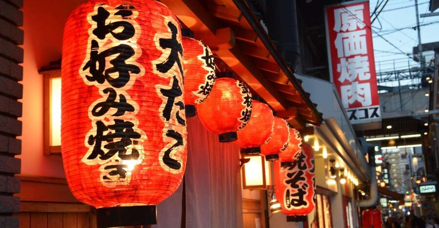 Osaka: Food Tour at Night with Tastings - Starting beneath Dotonbori’s famous lights