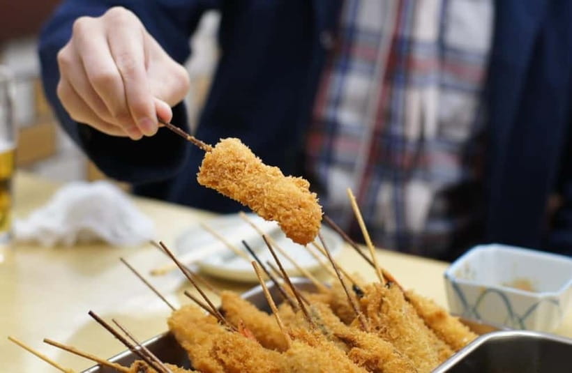 Osaka: Food Tour Kuromon Market & Dotonbori with Guide - Three-color dango at Mitoya