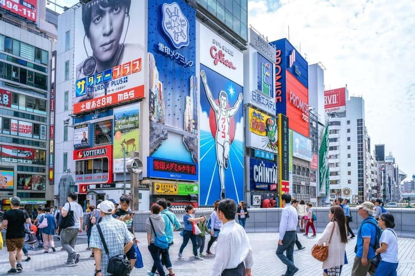 Osaka: Food Tour Kuromon Market & Dotonbori with Guide - Egg tart for a sweet finish