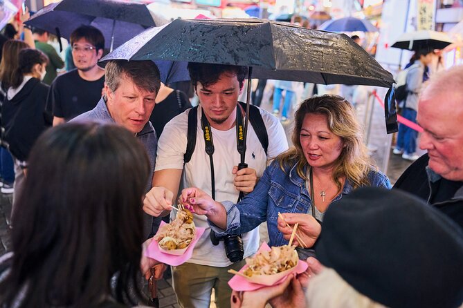Osaka: Guided Food Tour with 12 Dishes at 4 Local Eateries - Stop three: fresh fish and grilled skewers