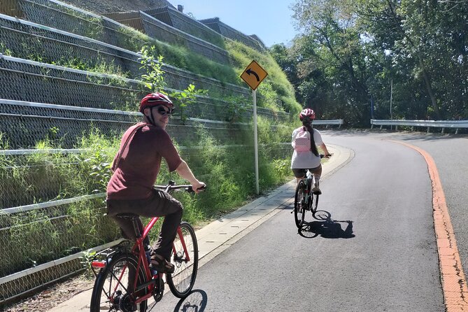 Osaka Half-day E-bike Adventure: Minoh Falls & Katsuoji Temple - Riding beside the Hankyu railway toward the hills