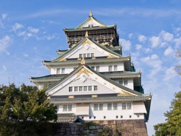 Osaka Highlights: 4-Hour Walking Tour with Castle - Osaka Castle: grand grounds, skip the inside