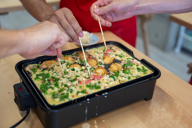 Osaka Home Feast Cooking and Sake Experience - Sake pairings and the taku-nomi mood