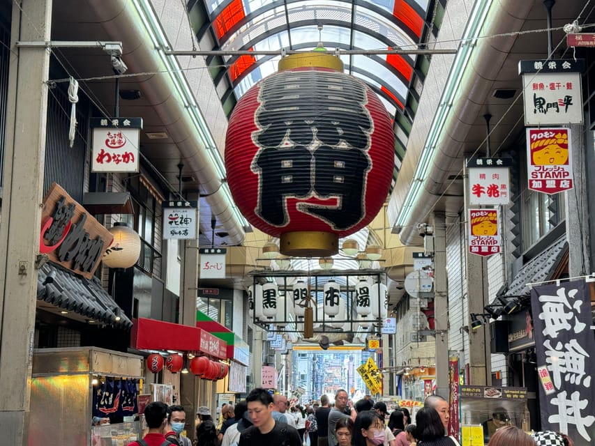 Osaka: Kuromon Market 1.5-Hour Seafood & Street Food Tour - Meeting your guide at Sennichimae Police Box