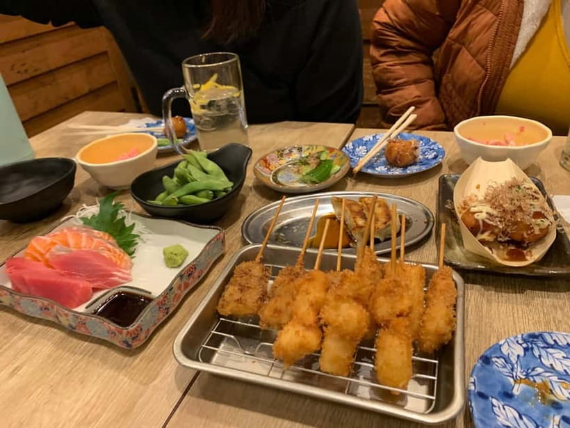 Osaka: Namba Pub Bar Crawl with a Local Guide - Final stop: American Village and Japanese whisky