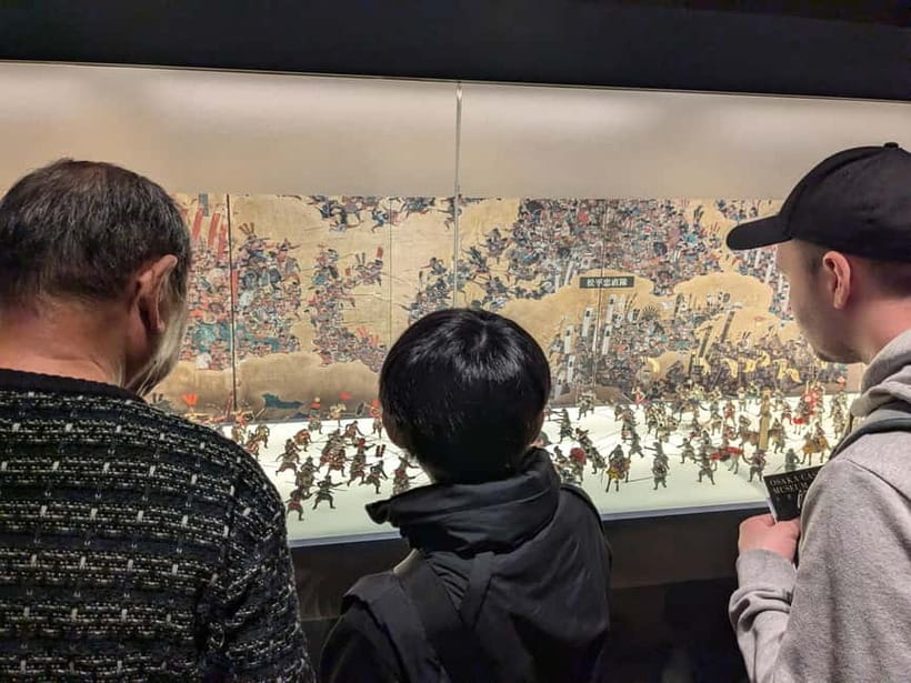 Osaka: Osaka Castle Guided Tour with Local Guide - Walking the stone walls and historic grounds