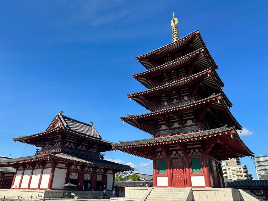 Osaka: Private Tour of Shitennoji, Osaka's Oldest Temple - Meeting beneath the Stone Torii Gate