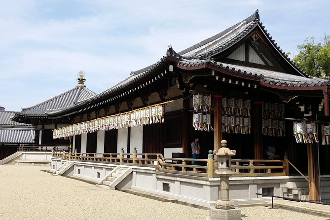 Osaka’s Best and Brightest: Private Full-Day Tour by Vehicle - Shinsekai shows Osaka’s playful side