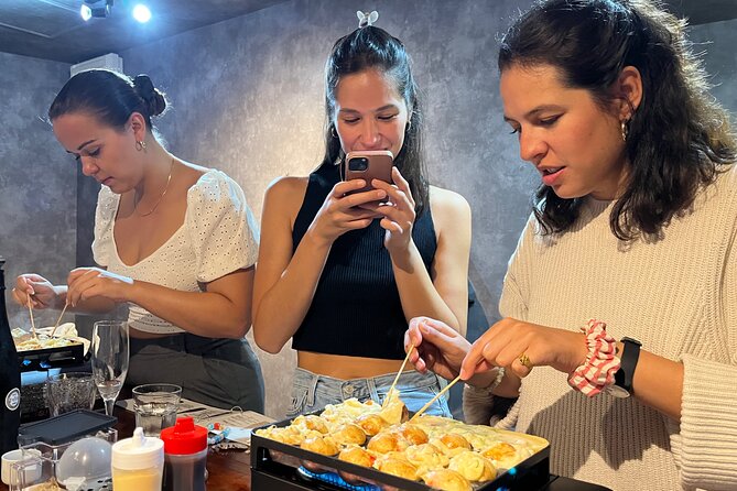 Osaka Sake Tasting & Takoyaki Cooking Experience - The small room is part of the appeal
