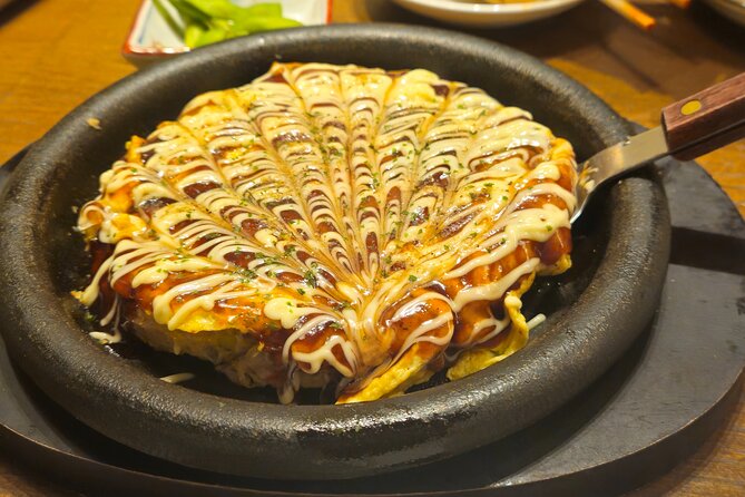 Osaka: Shinsekai Food Tour - 13 Dishes at 5 Local Eateries - Eating your way through five small eateries