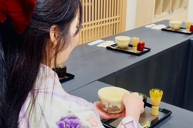 Tea and Calligraphy Session at a Table in Osaka - Key points at a glance