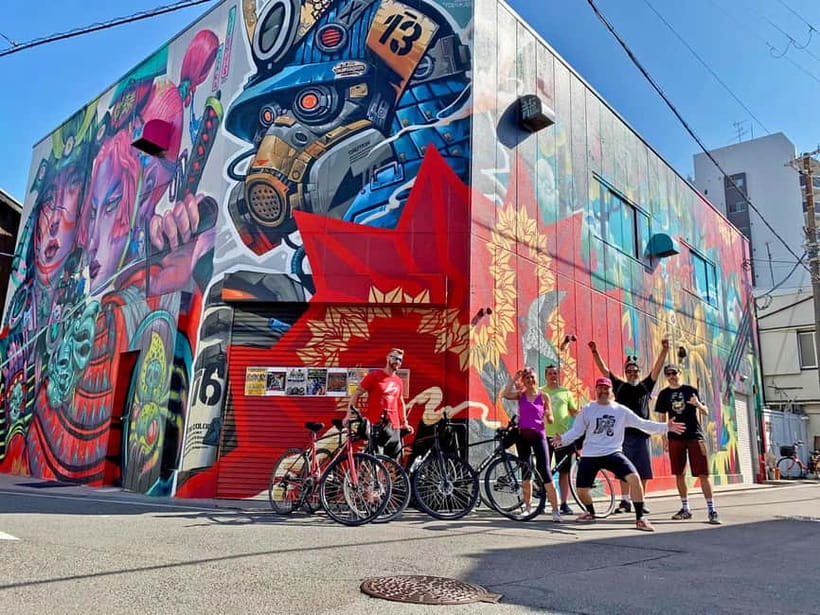 Urban Canvas: Osaka Street Art Bike Tour - Tenma begins the ride with a local view